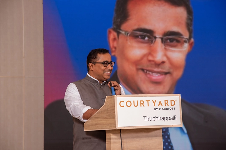Motivational speaker delivering Business Owner Growth Talk at Courtyard Marriott Tiruchirappalli