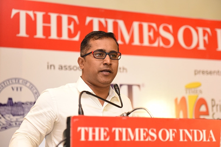 Growth coach addresses Times of India professionals with strategies for success leadership mindset.